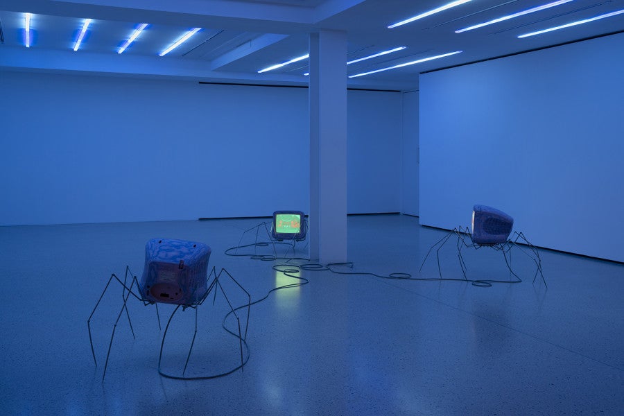 Untitled (Memorex), 2026 approx. 70 × 50 × 50 cm Memorex television, spray © paint, media player, video loop, stereo sound, aluminium mounting plate, forged stainless steel.  © Nicolas Brasseur 