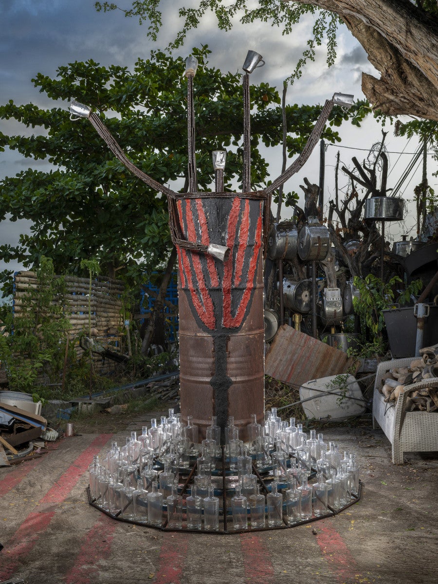 Christian Bertin, <i>Dlo Monté mòn</i>, 2025. Metal, candles, glass bottles, paint. Height: 290 cm. © ADAGP. Photo: Robert Charlotte.