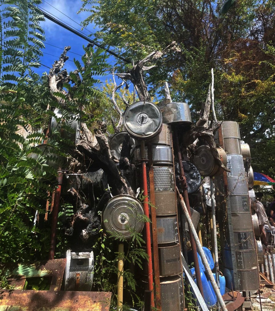 Christian Bertin, <i>Les Lavandières</i>, 2025. Installation (in progress). Washing machine parts, metal, plastic, concrete blocks, rubber, paint. Variable dimensions. View of the artist’s studio, February 2024. © ADAGP. Photo: Skye Arundhati Thomas.